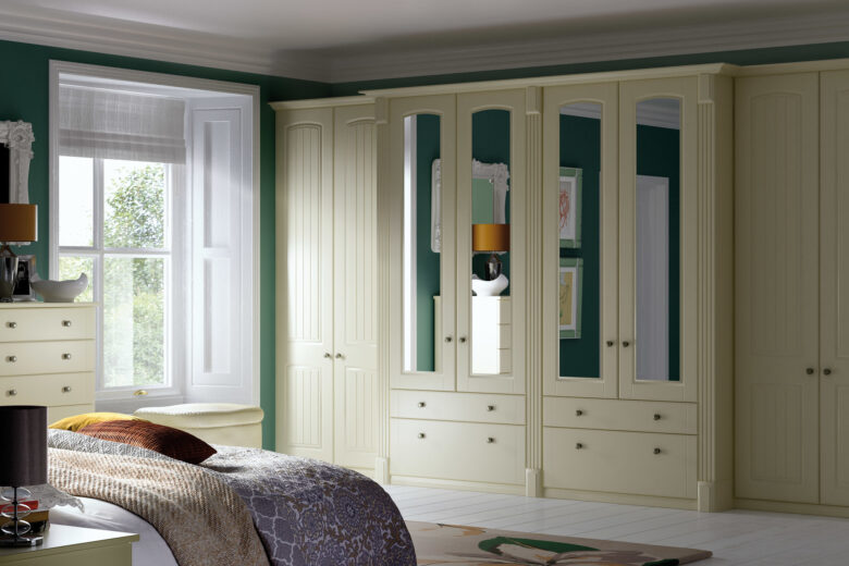 Modern fitted wardrobes within a bedroom