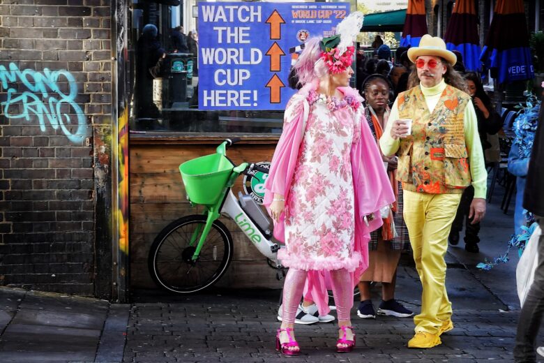 Colourful couple dressed in retro clothing