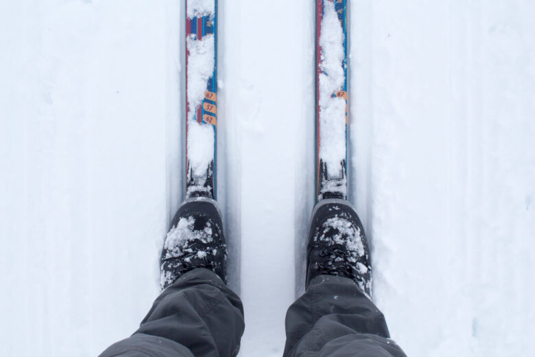 Looking down at a a pair of skis