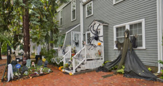 Spooky decorations outside of a house