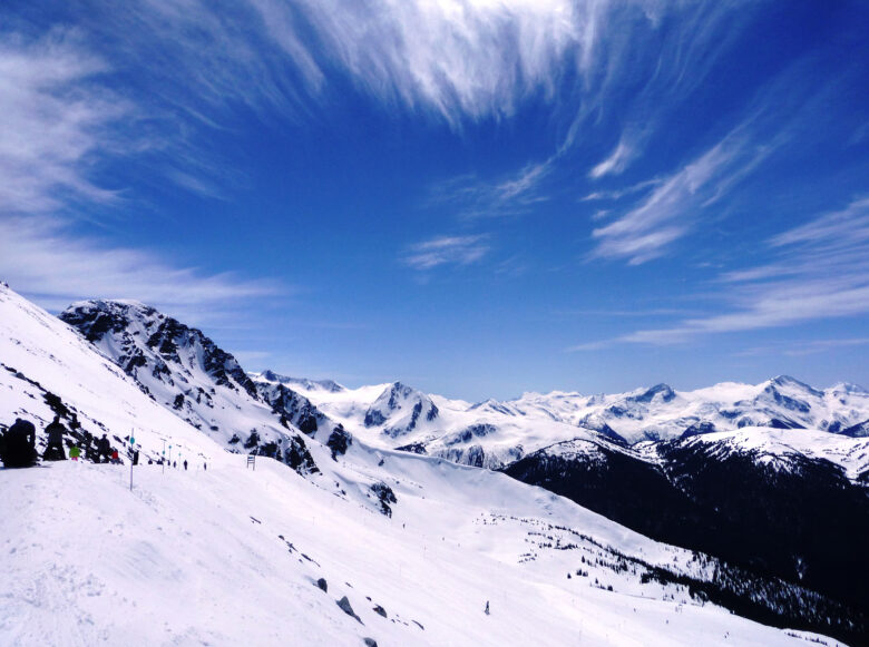 Dramatic blue sky over Whistler ski slope